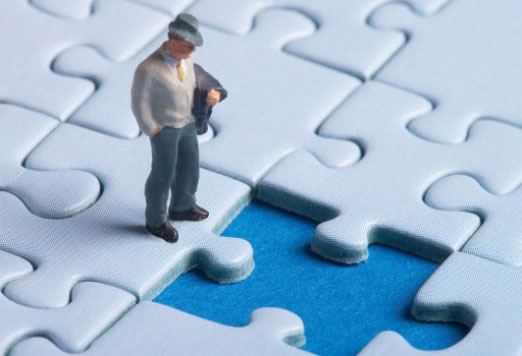 man-figurine-standing-on-jigsaw-puzzle-missing-piece - arunace